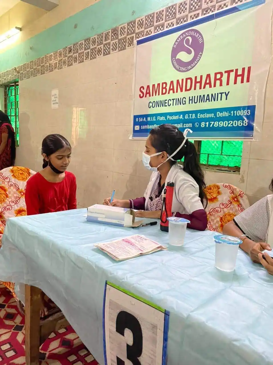 Doctors providing medical care at health camp